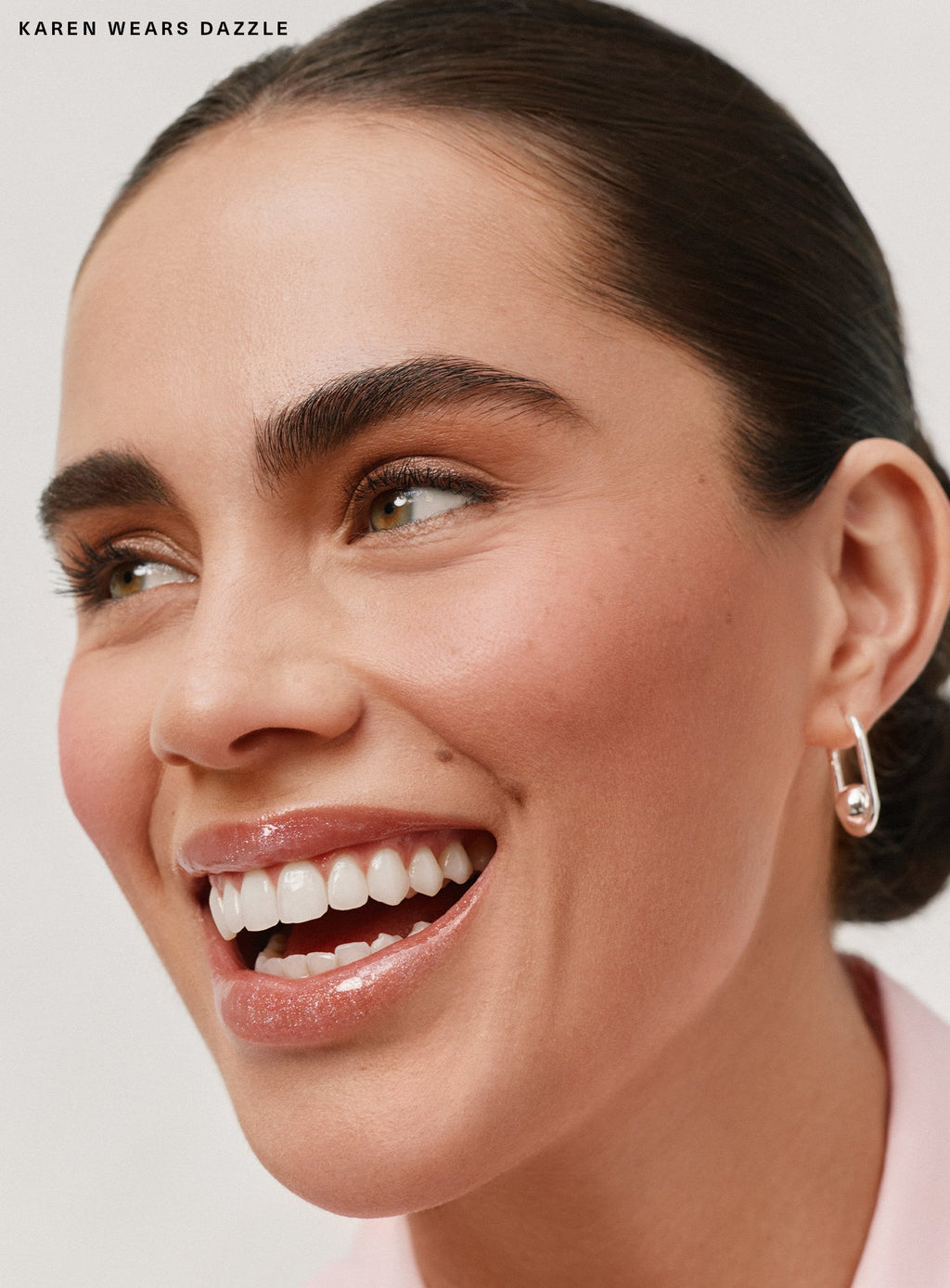 Positive Light Luminizing Lip Gloss by Rare Beauty