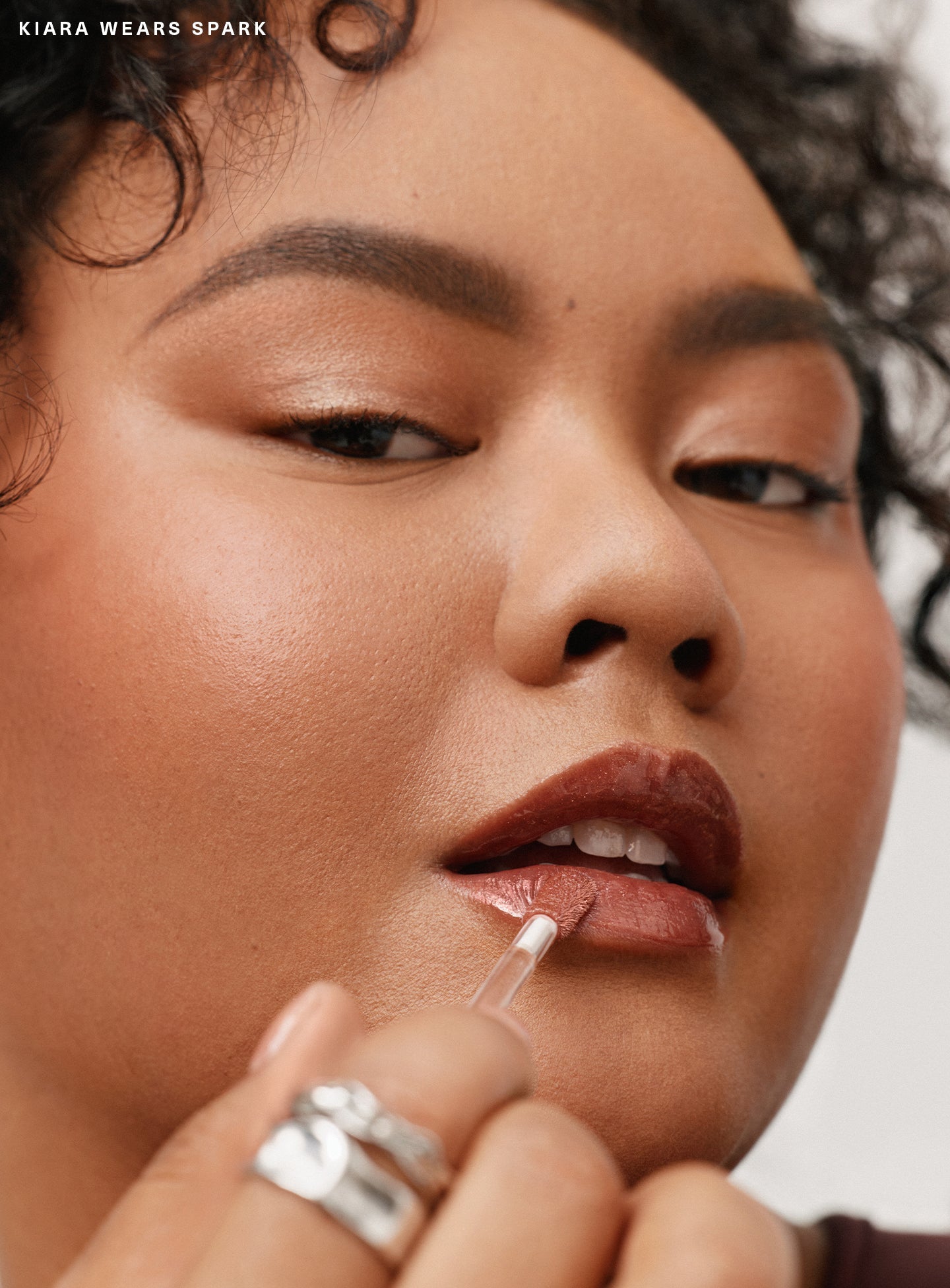 Positive Light Luminizing Lip Gloss by Rare Beauty