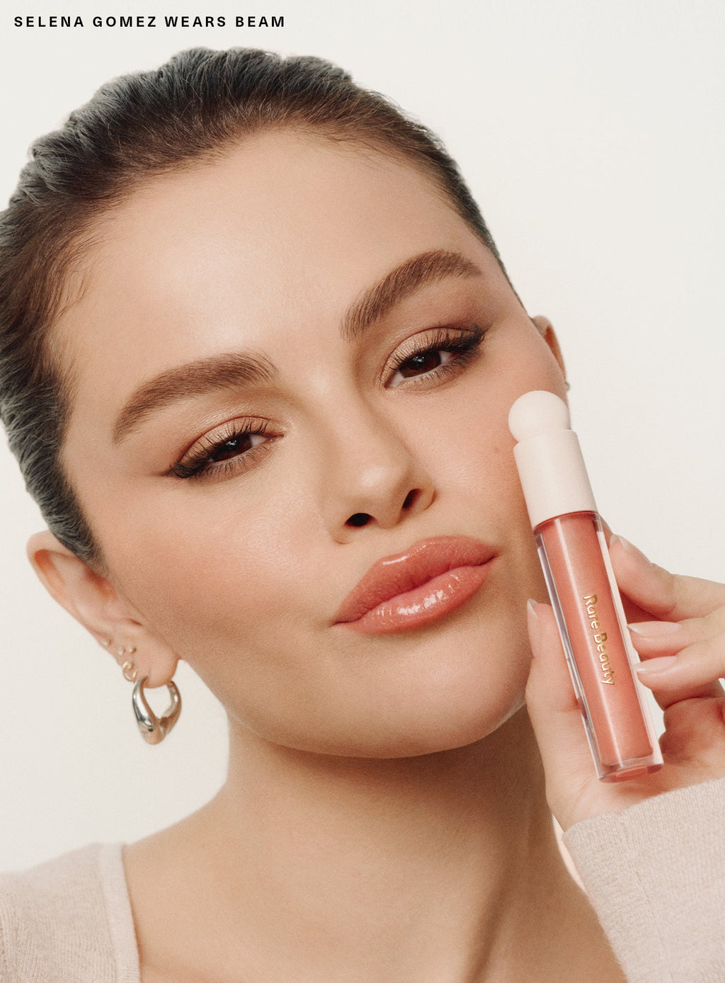 Positive Light Luminizing Lip Gloss by Rare Beauty