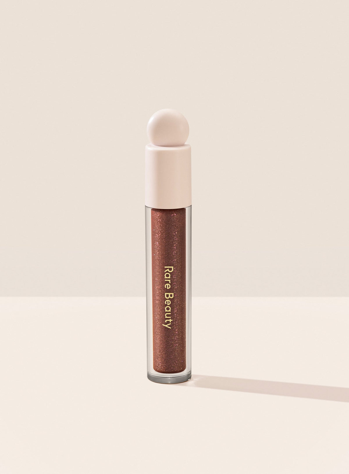 Positive Light Luminizing Lip Gloss by Rare Beauty