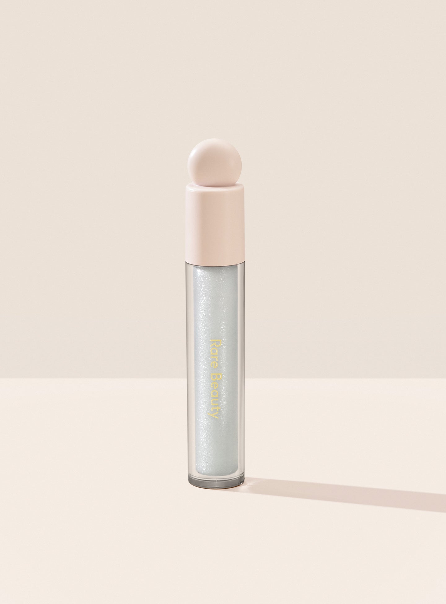 Positive Light Luminizing Lip Gloss by Rare Beauty