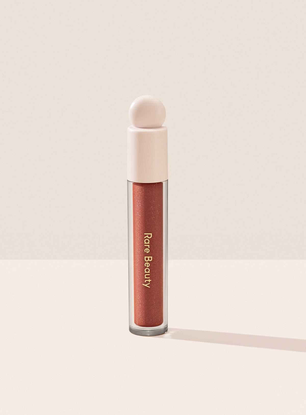 Positive Light Luminizing Lip Gloss by Rare Beauty