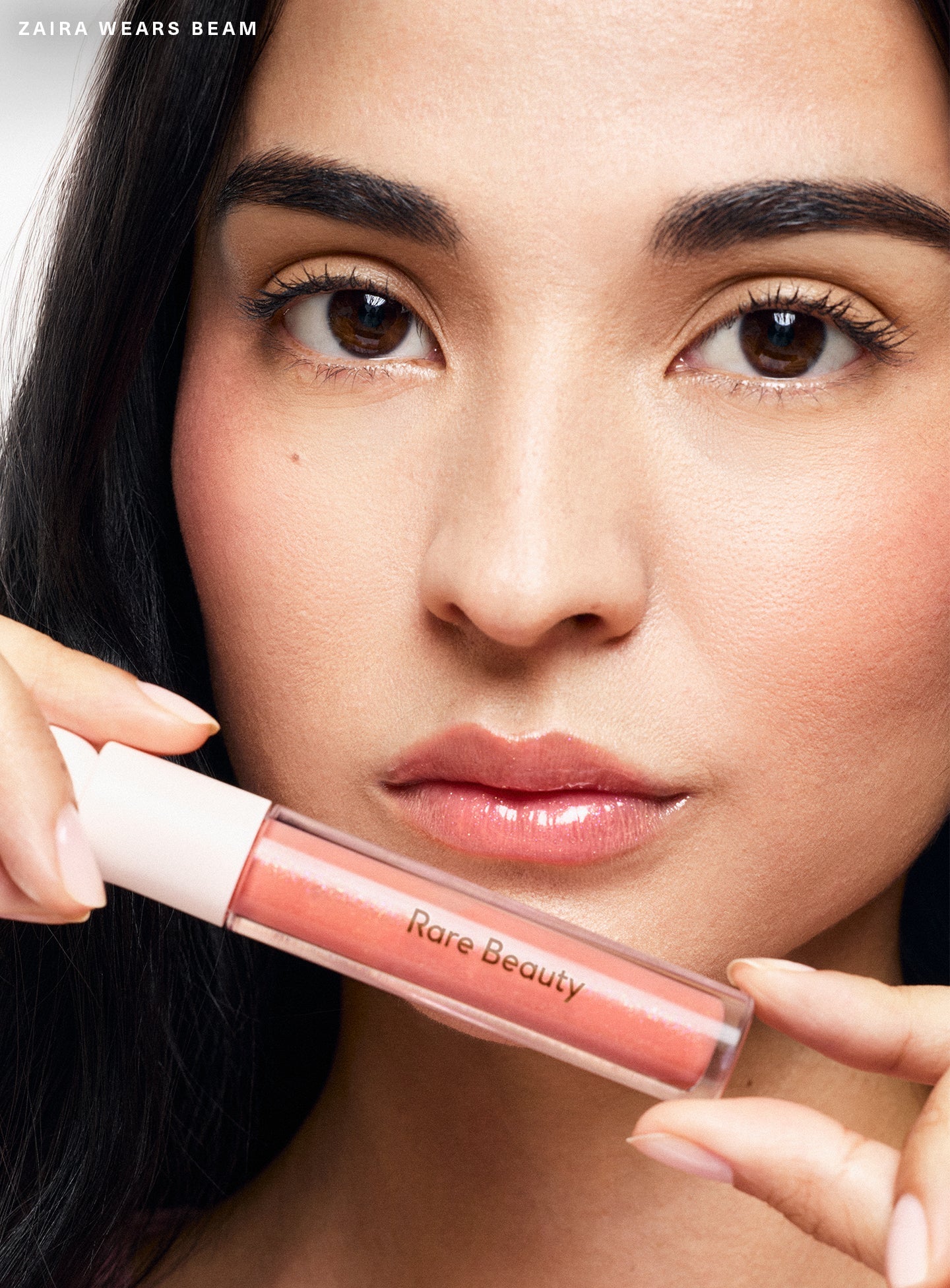 Positive Light Luminizing Lip Gloss by Rare Beauty