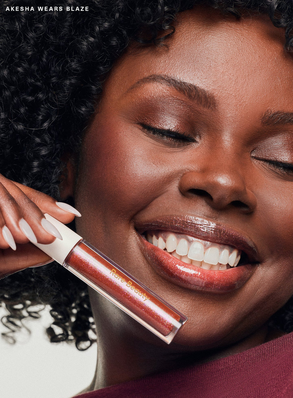 Positive Light Luminizing Lip Gloss by Rare Beauty