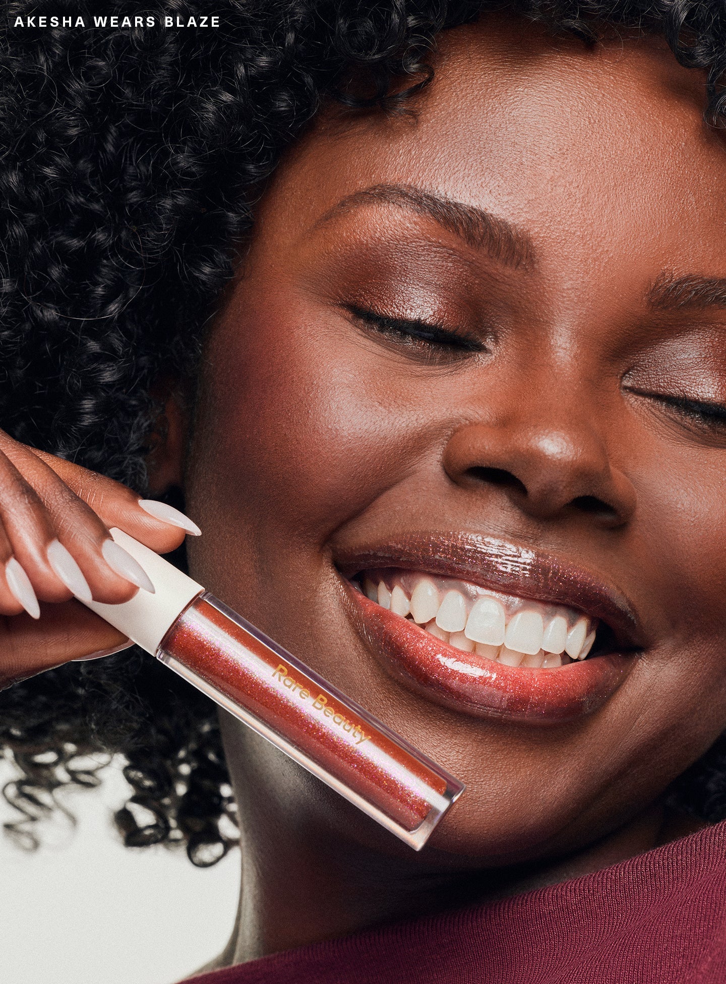 Positive Light Luminizing Lip Gloss by Rare Beauty