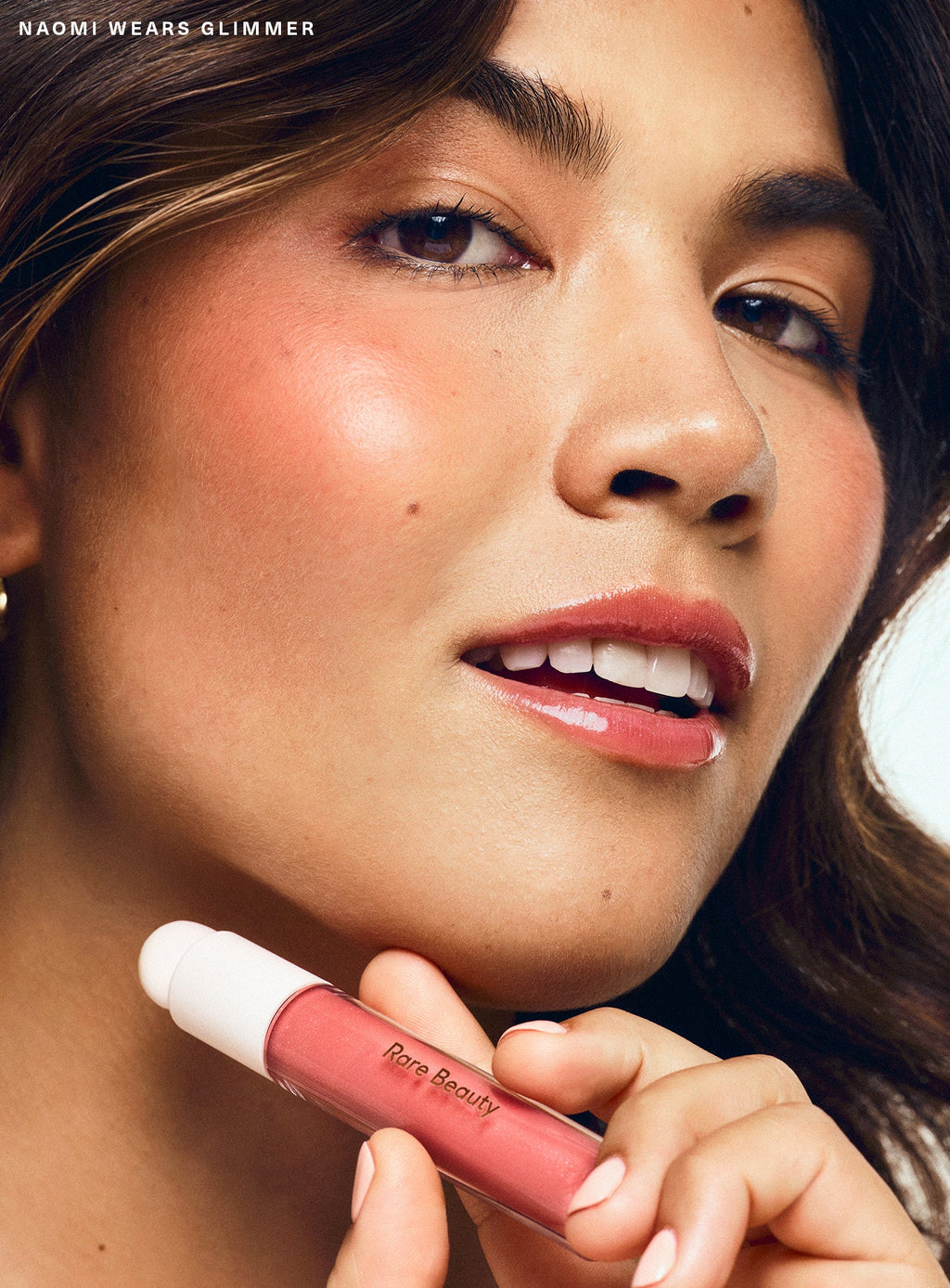 Positive Light Luminizing Lip Gloss by Rare Beauty